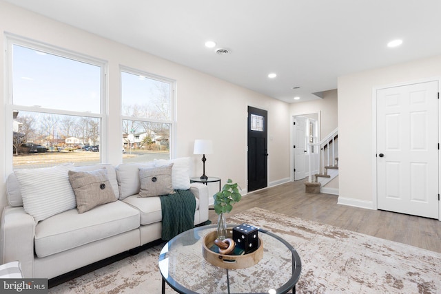 living room with light hardwood / wood-style floors