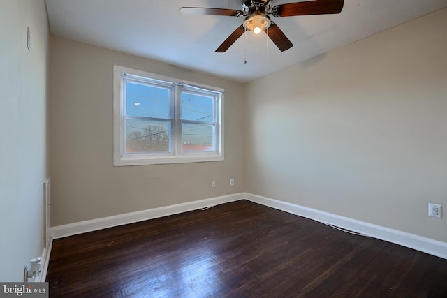 unfurnished room featuring ceiling fan and dark hardwood / wood-style flooring