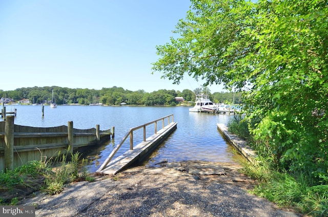 dock area featuring a water view