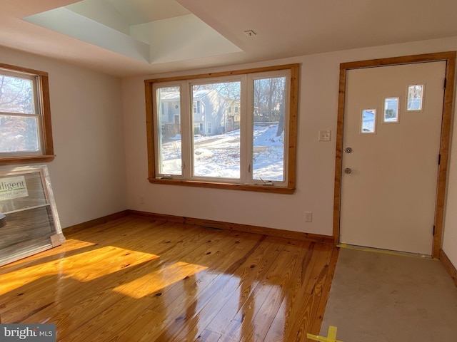 unfurnished living room featuring light hardwood / wood-style flooring