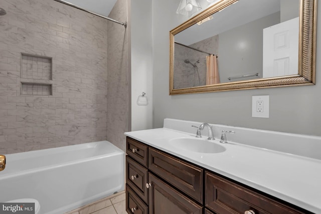 bathroom featuring vanity, toilet, shower / tub combo with curtain, and tile patterned floors