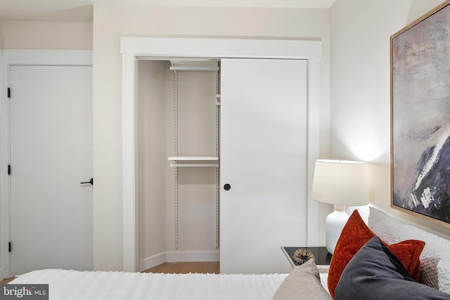 bedroom featuring a closet and hardwood / wood-style floors