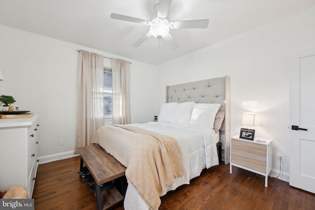 bedroom with dark wood-type flooring and ceiling fan