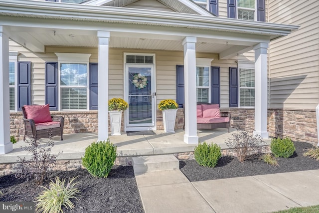 entrance to property with covered porch