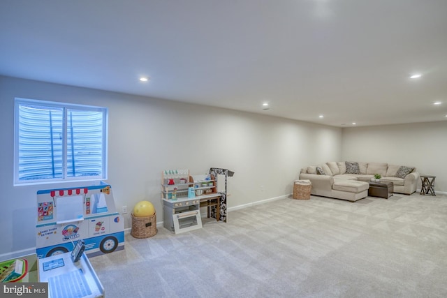 playroom featuring light carpet