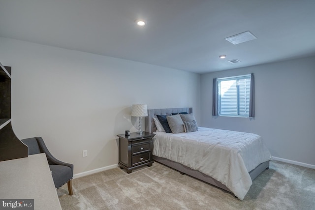 bedroom with light carpet