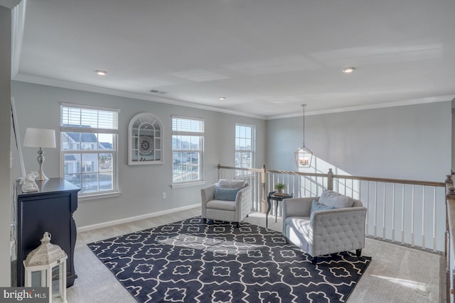 sitting room with ornamental molding