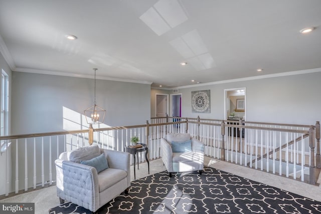 living area featuring ornamental molding, light colored carpet, and a notable chandelier