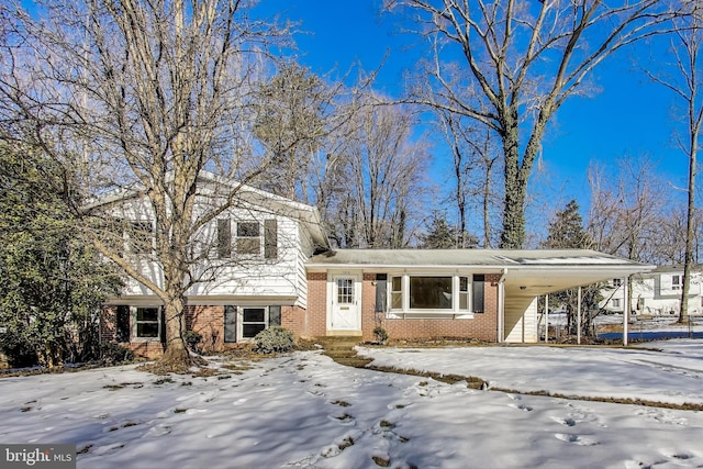 tri-level home featuring a carport