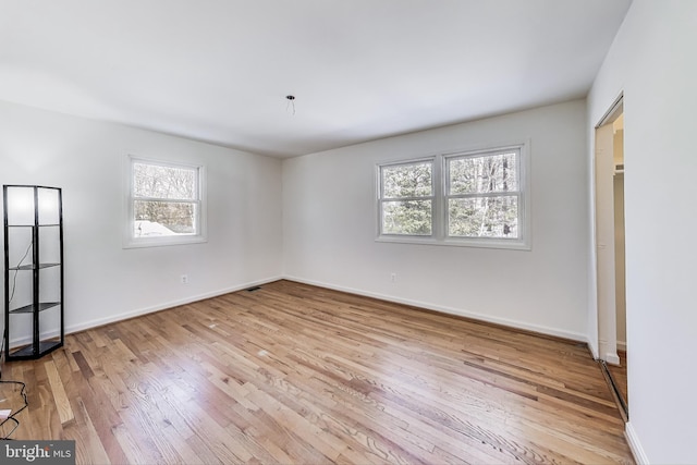 empty room featuring light hardwood / wood-style flooring