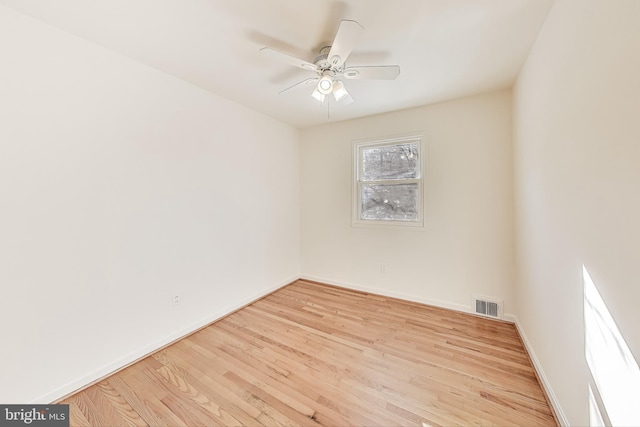 unfurnished room featuring ceiling fan and light hardwood / wood-style flooring