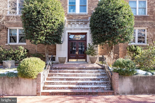 entrance to property featuring french doors