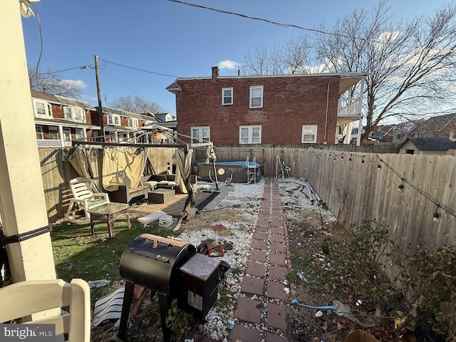 view of yard featuring a swimming pool and an outdoor hangout area