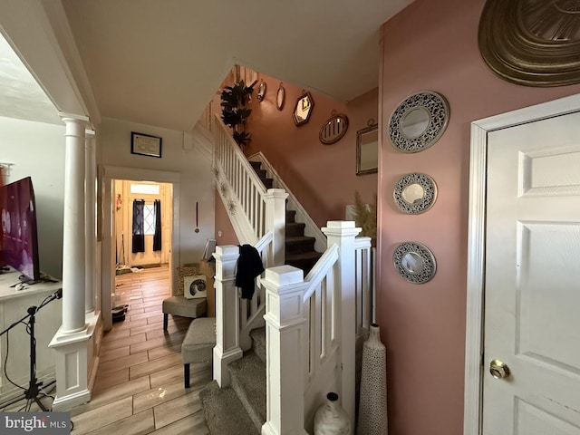 stairway with decorative columns