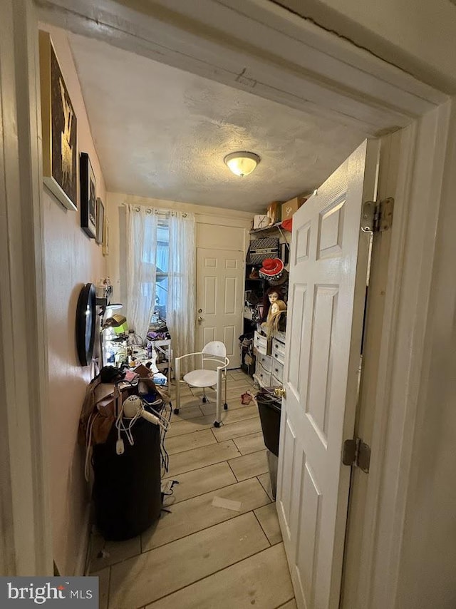 washroom with light wood-type flooring