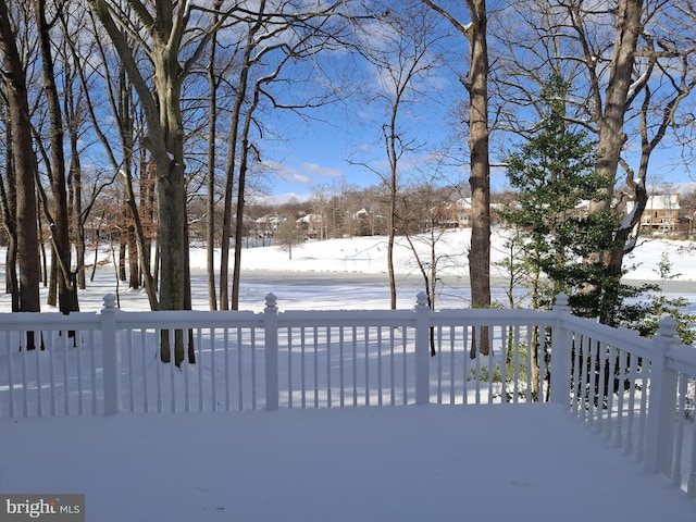 view of snow covered deck