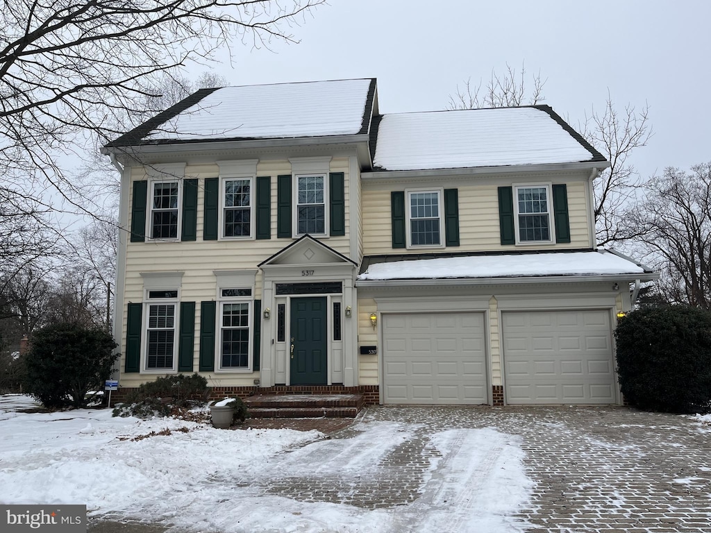 view of front of property featuring a garage