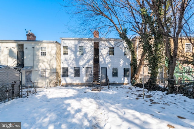 view of snow covered property