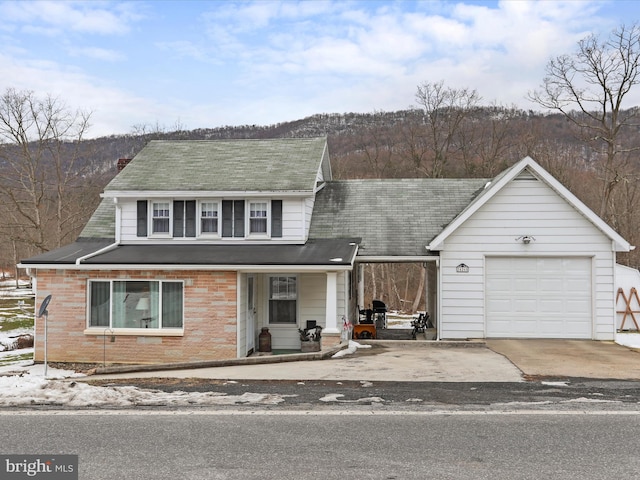 view of front of home with a garage and covered porch