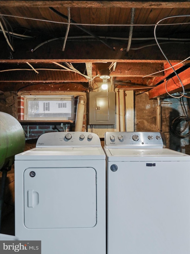 laundry room featuring separate washer and dryer and electric panel