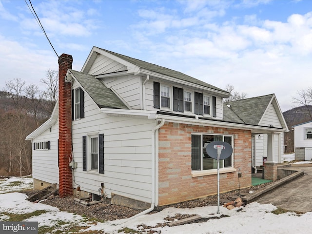 view of snow covered property