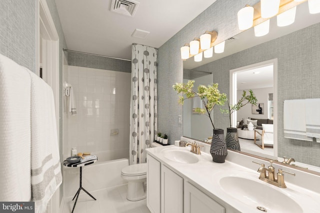 full bathroom with toilet, vanity, tile patterned floors, and shower / bath combination with curtain