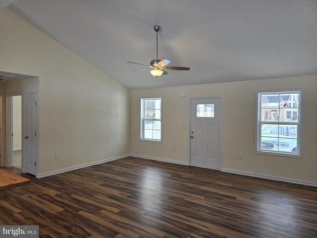 entrance foyer featuring dark wood-type flooring, high vaulted ceiling, and ceiling fan