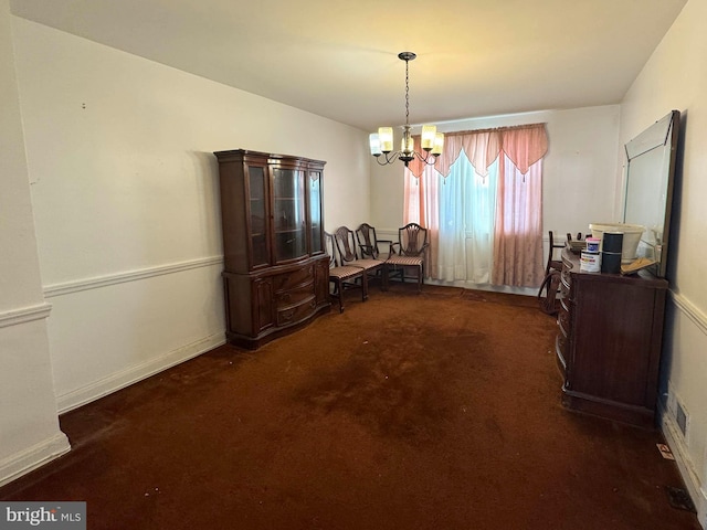 dining area featuring a chandelier