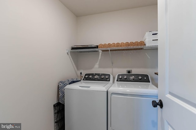 laundry area with washer and clothes dryer