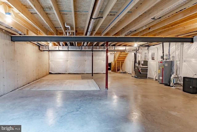 basement with heating unit and water heater