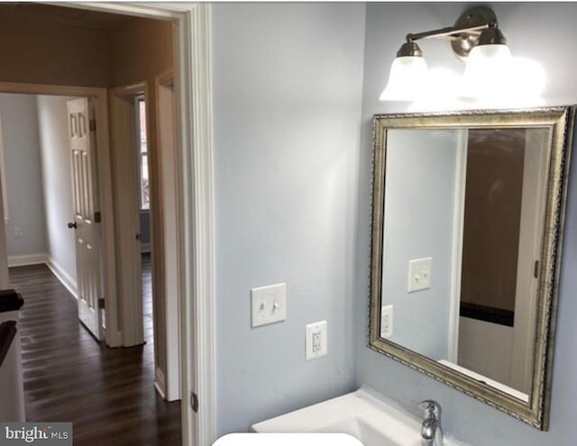 bathroom featuring hardwood / wood-style flooring