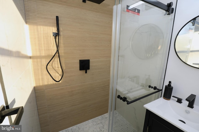 bathroom with vanity and walk in shower