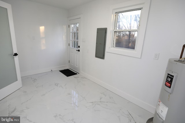 doorway to outside with electric panel, electric water heater, and a wealth of natural light