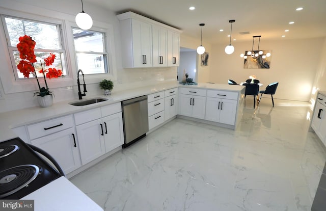 kitchen with decorative light fixtures, white cabinets, tasteful backsplash, kitchen peninsula, and stainless steel dishwasher