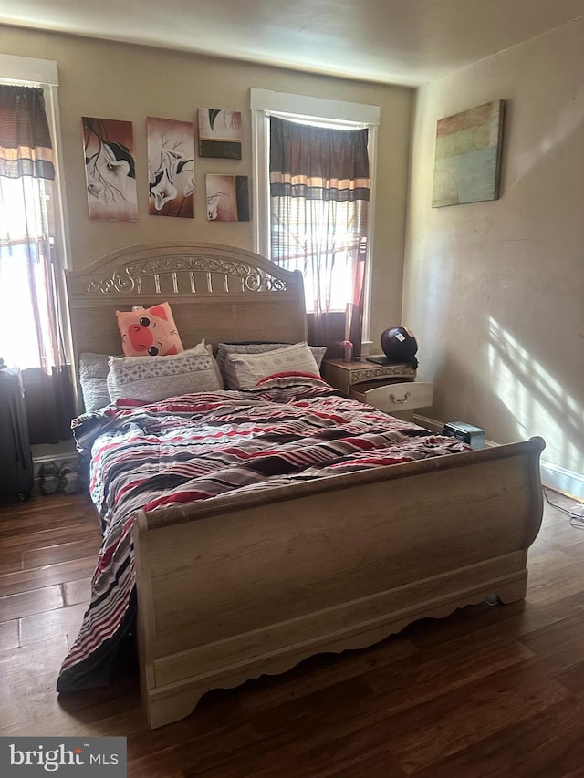 bedroom featuring wood-type flooring