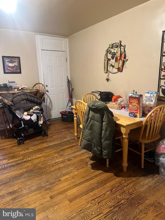 dining area featuring hardwood / wood-style floors