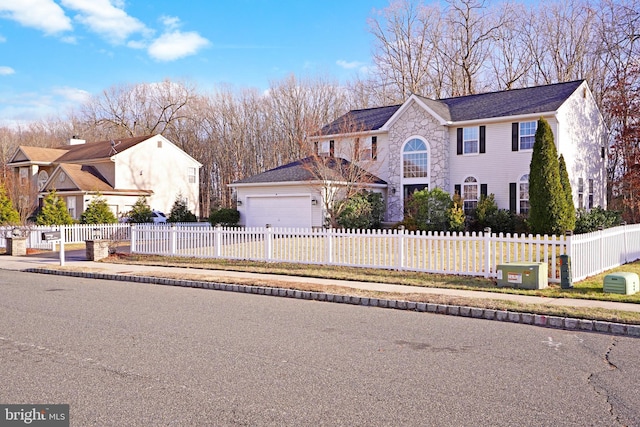 view of front of house with a garage