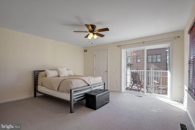 carpeted bedroom with access to exterior and ceiling fan