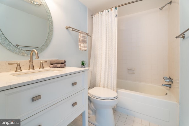 full bathroom with toilet, shower / bath combo, vanity, and tile patterned floors