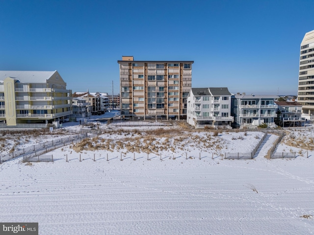 view of snow covered property