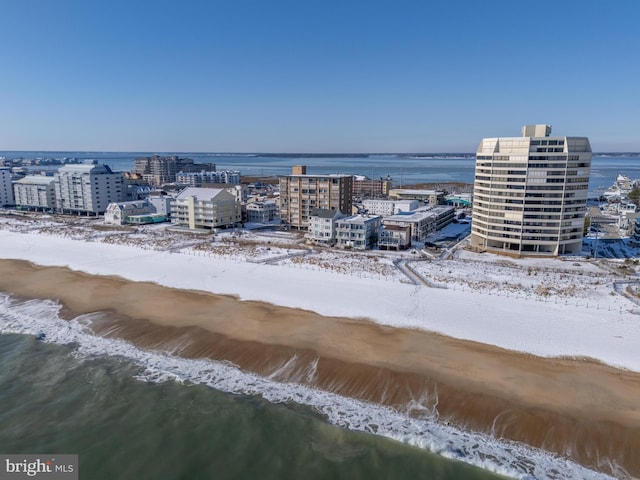 bird's eye view with a beach view and a water view