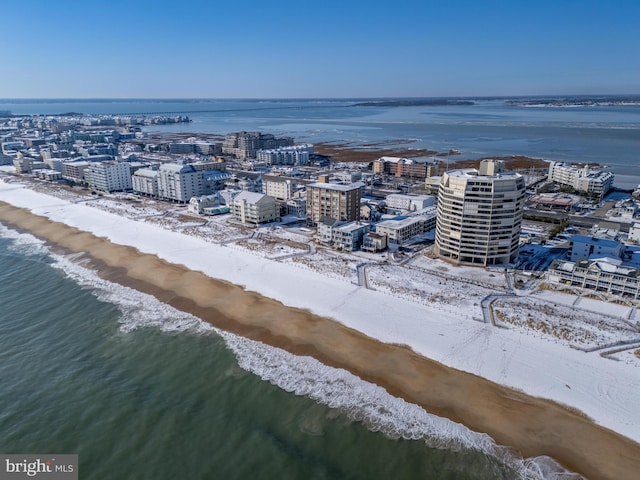 bird's eye view with a view of the beach and a water view