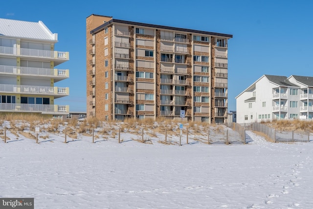 view of snow covered property