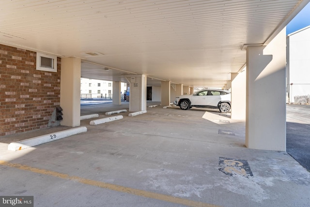 garage featuring a carport