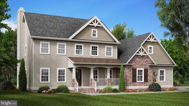 view of front of house with a shingled roof, a chimney, a front lawn, and a porch