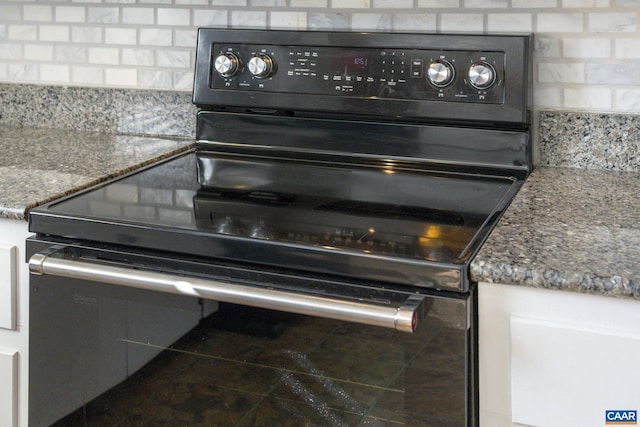 details with electric range, stone counters, and decorative backsplash