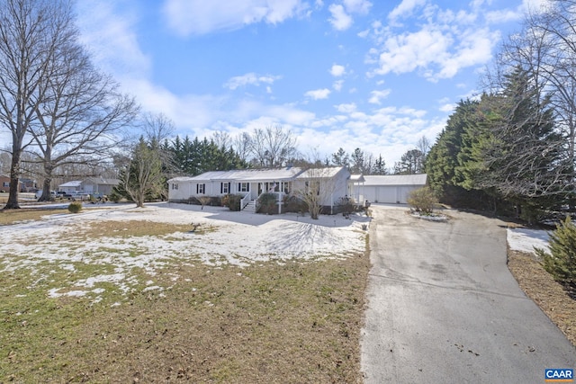 single story home featuring a garage