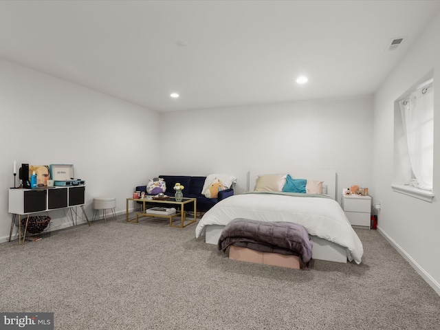 carpeted bedroom with recessed lighting, visible vents, and baseboards