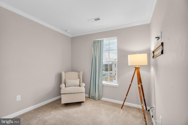 living area featuring ornamental molding and light colored carpet