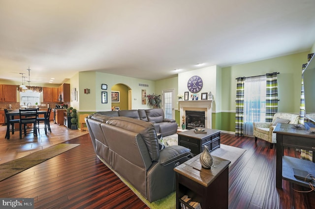 living room featuring dark hardwood / wood-style floors